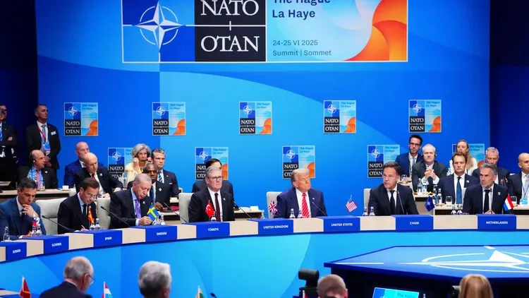 NATO Secretary General Mark Rutte, center right, gives the opening speech as he sits next to US President Donald Trump during a meeting of the North Atlantic Council at the NATO summit in The Hague - Source
